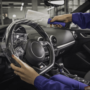 Stretch wrap steering wheel protection film with handle for automotive workshops - 10 rolls