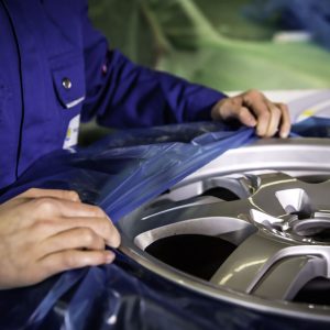 Applying Wondermask WPS to tyre before spraying alloy wheel