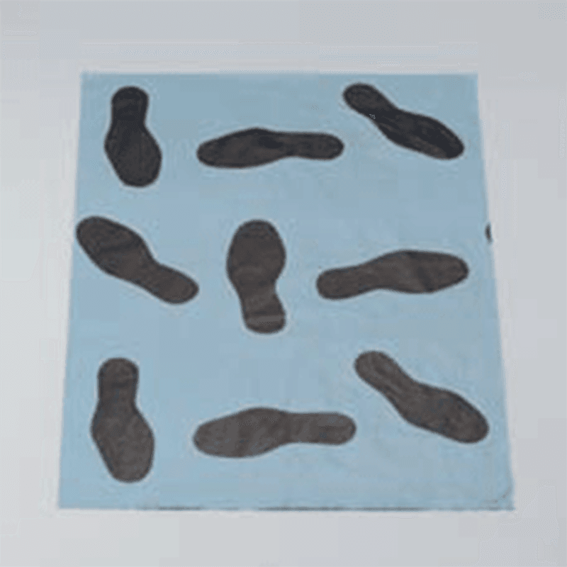 Disposable grey polythene vehicle floor mat used in automotive workshops to protect car carpets from dirt and oil
