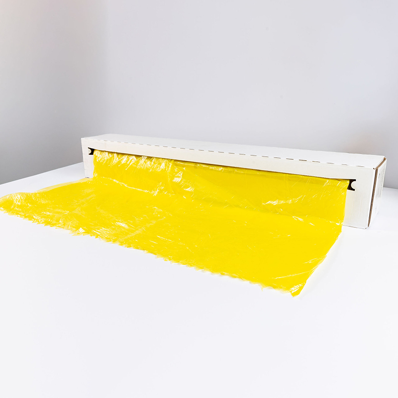 Close up of 307298 yellow polythene 4m x 200m in dust-proof dispenser box