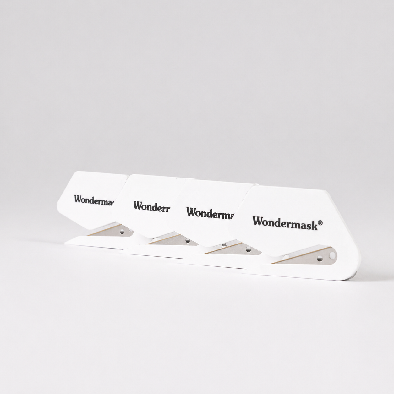 Pack of 4 Wondermask automotive masking film cutters for bodyshop teams